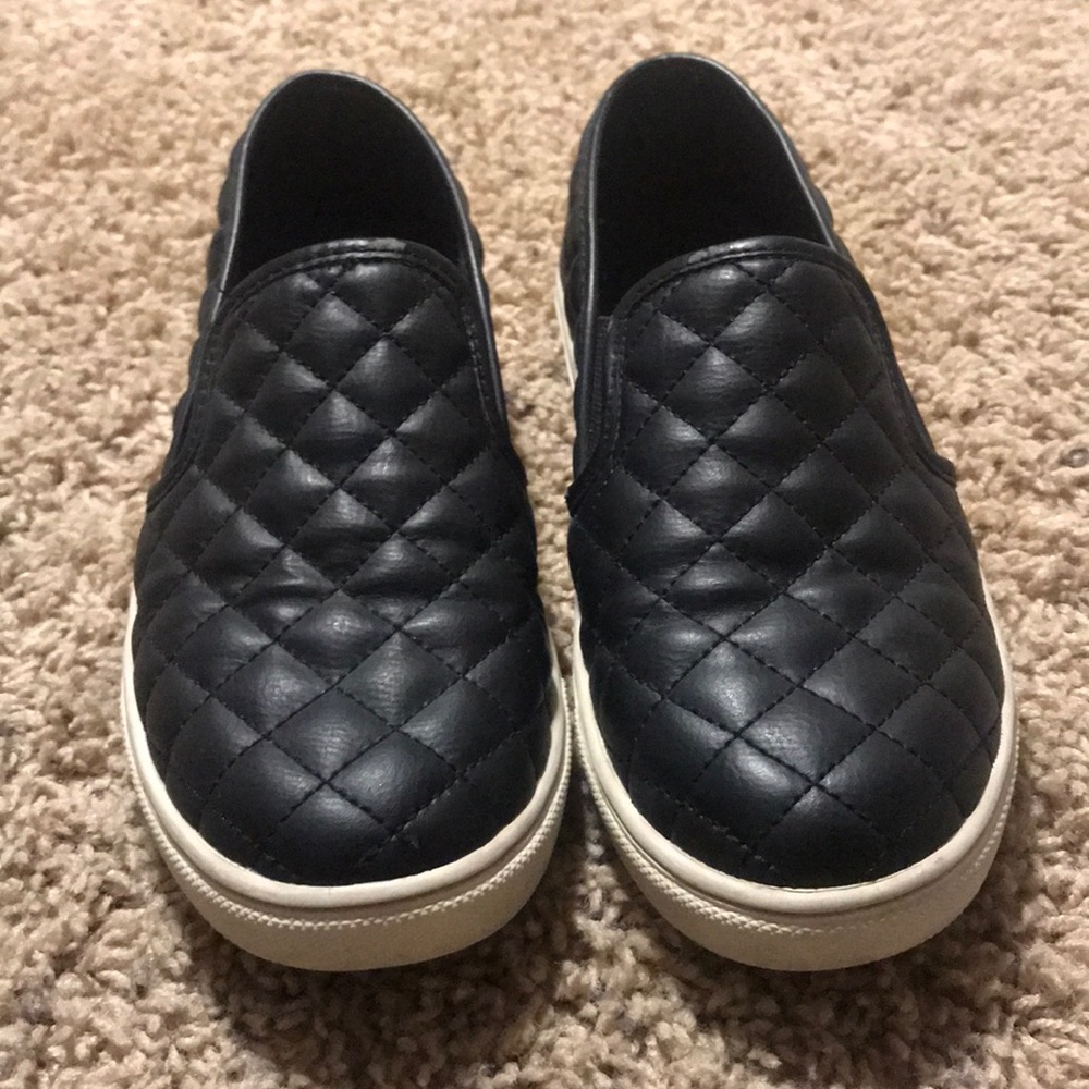 Black Steve Madden slip-ons